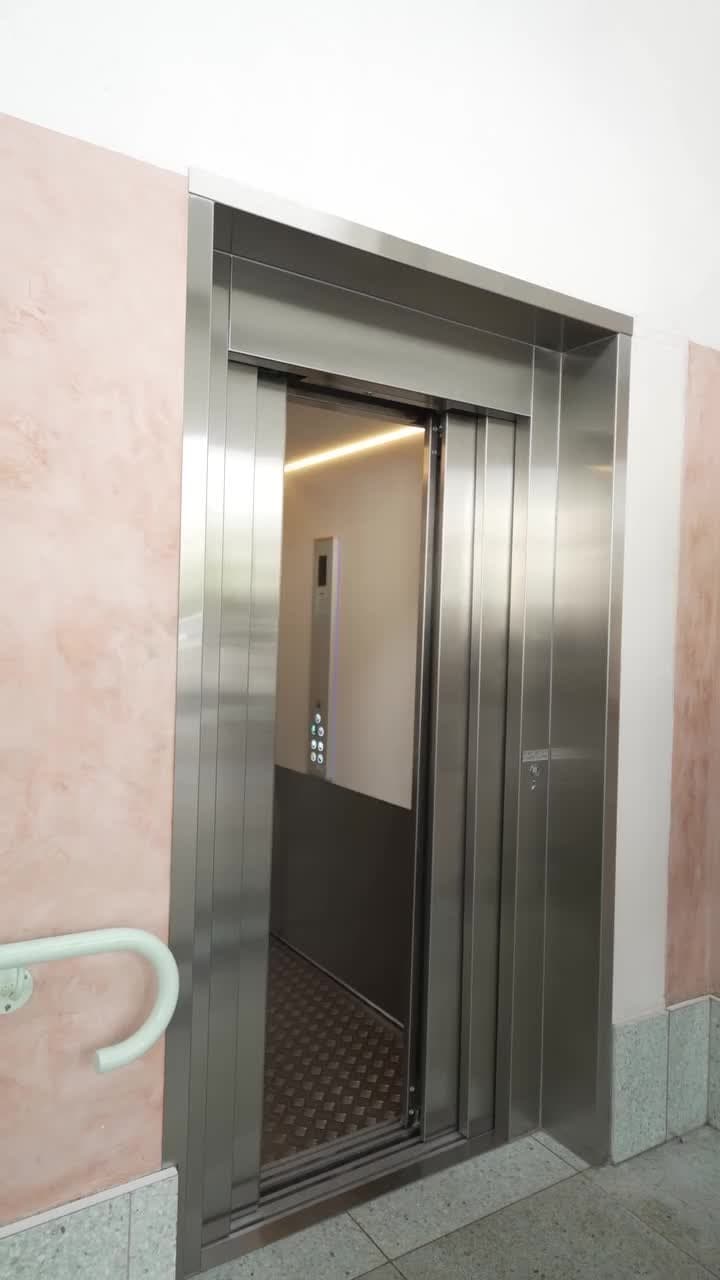 Custom Orion commercial lift with brushed stainless doors open at Burleigh Pavilion, Gold Coast