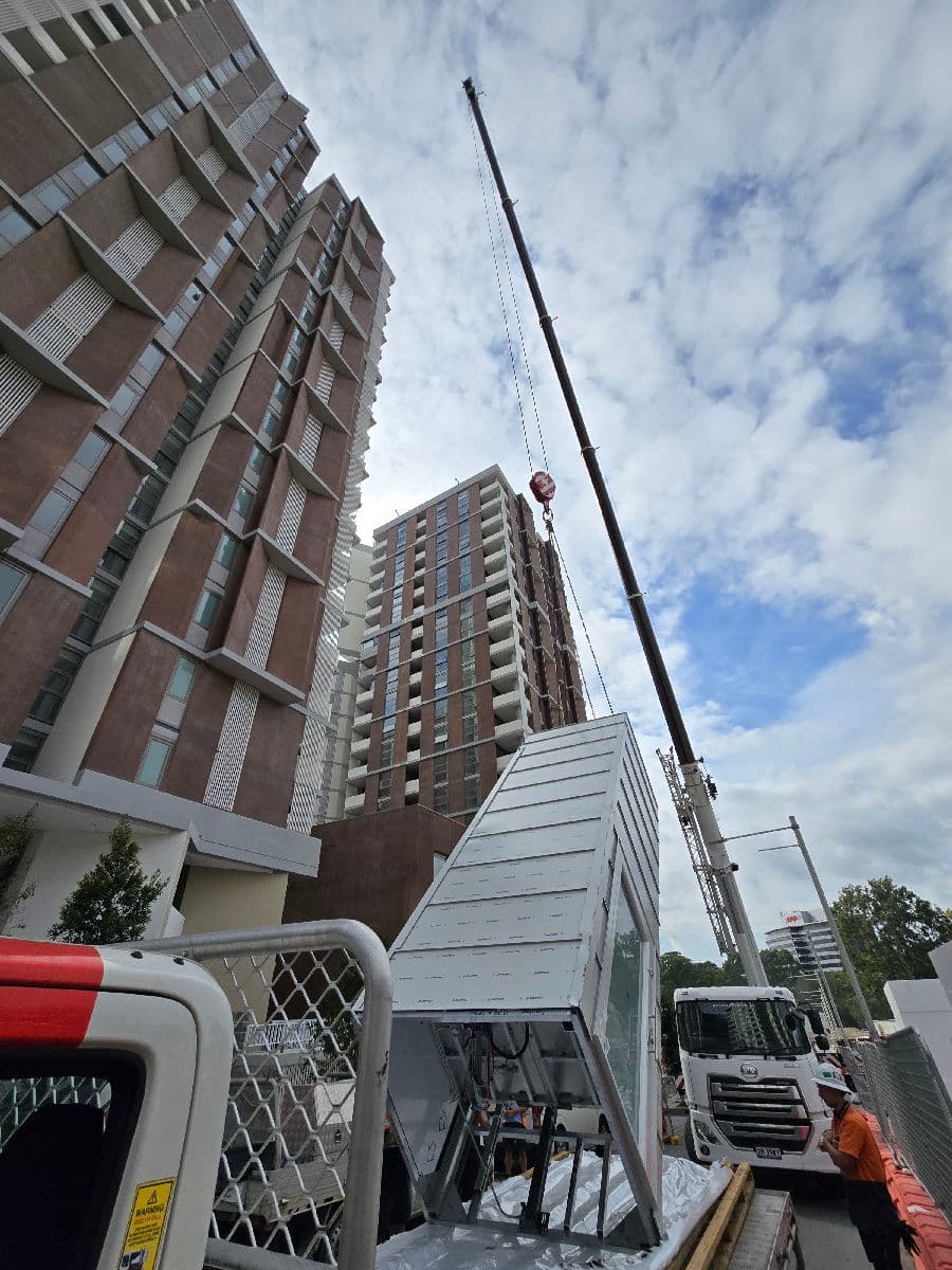 Lift shaft arriving on a flatbed truck, Macquarie Park