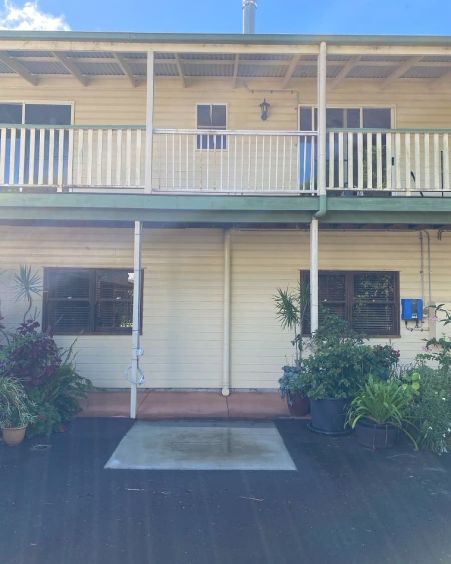 Mt Tamborine Queenslander before the Phoenix home lift install, concrete pad under the balcony